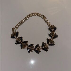 Elegant Gold and Black Floral Bracelet